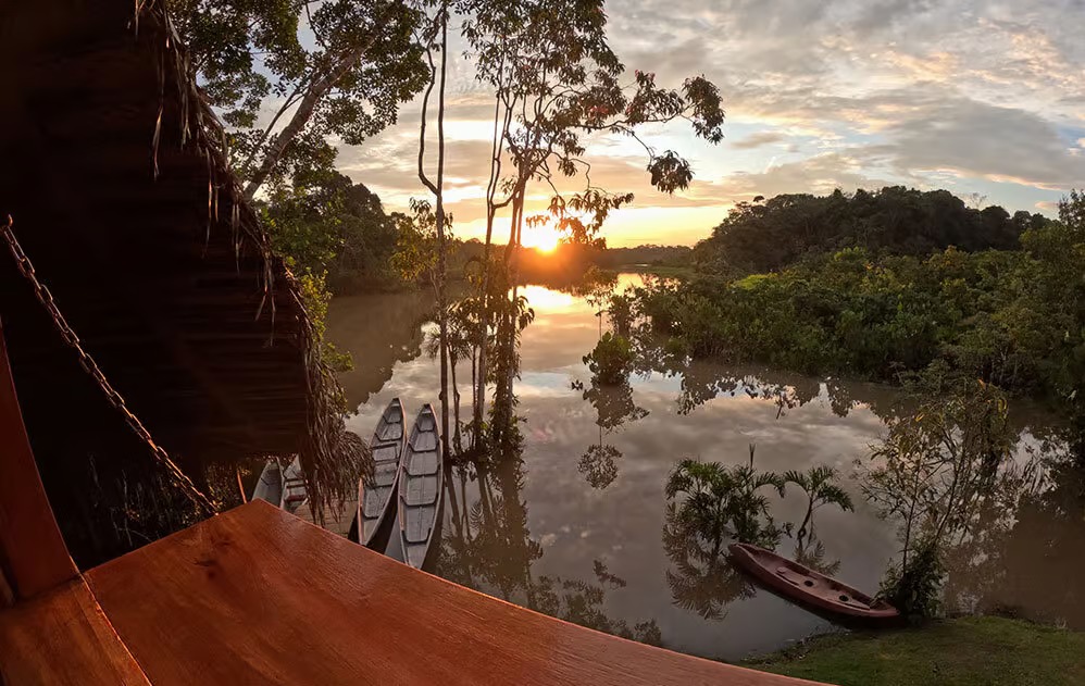 Sani Lodge canoe at sunset