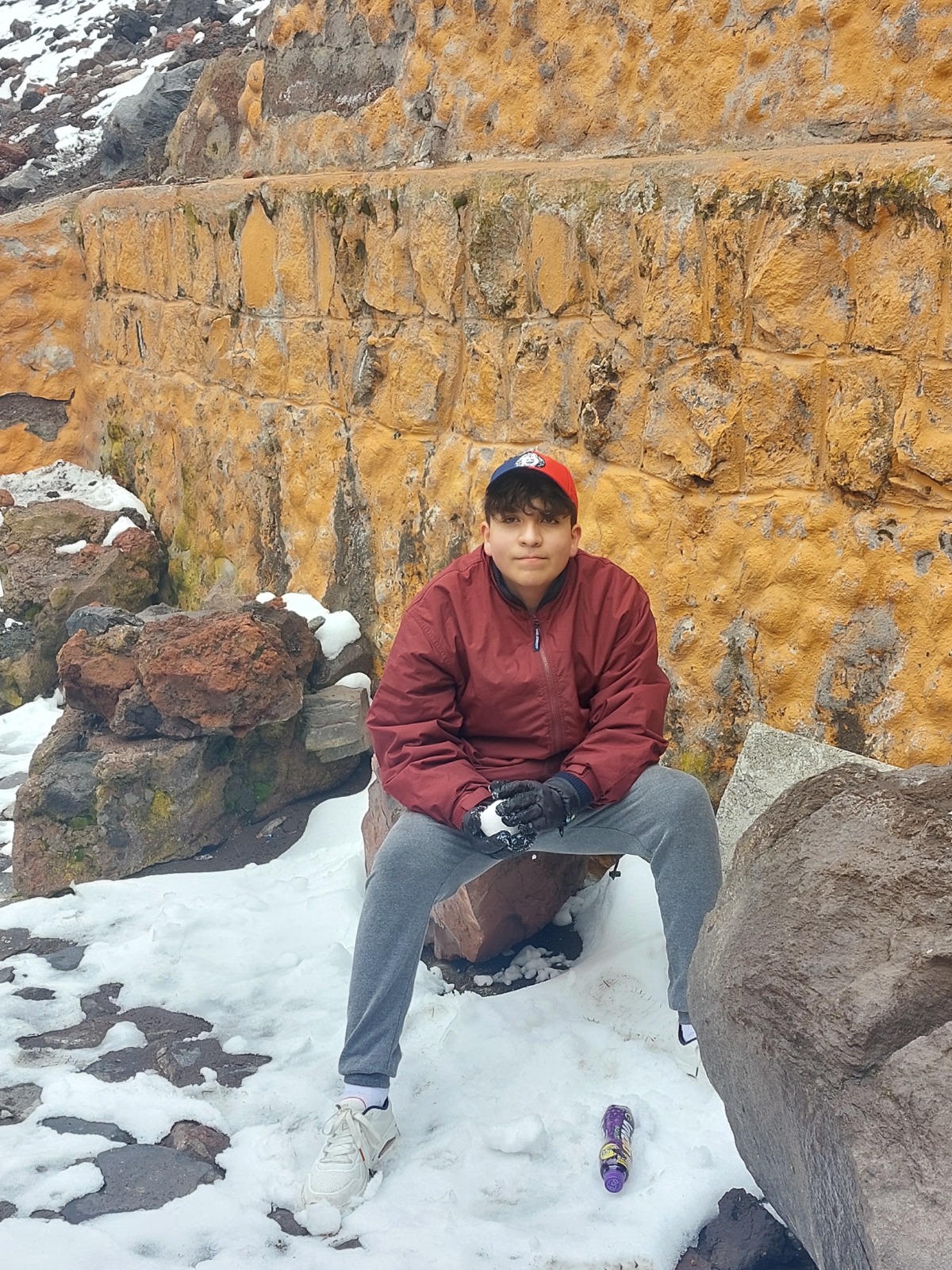 Traveler enjoying snow near Cotopaxi