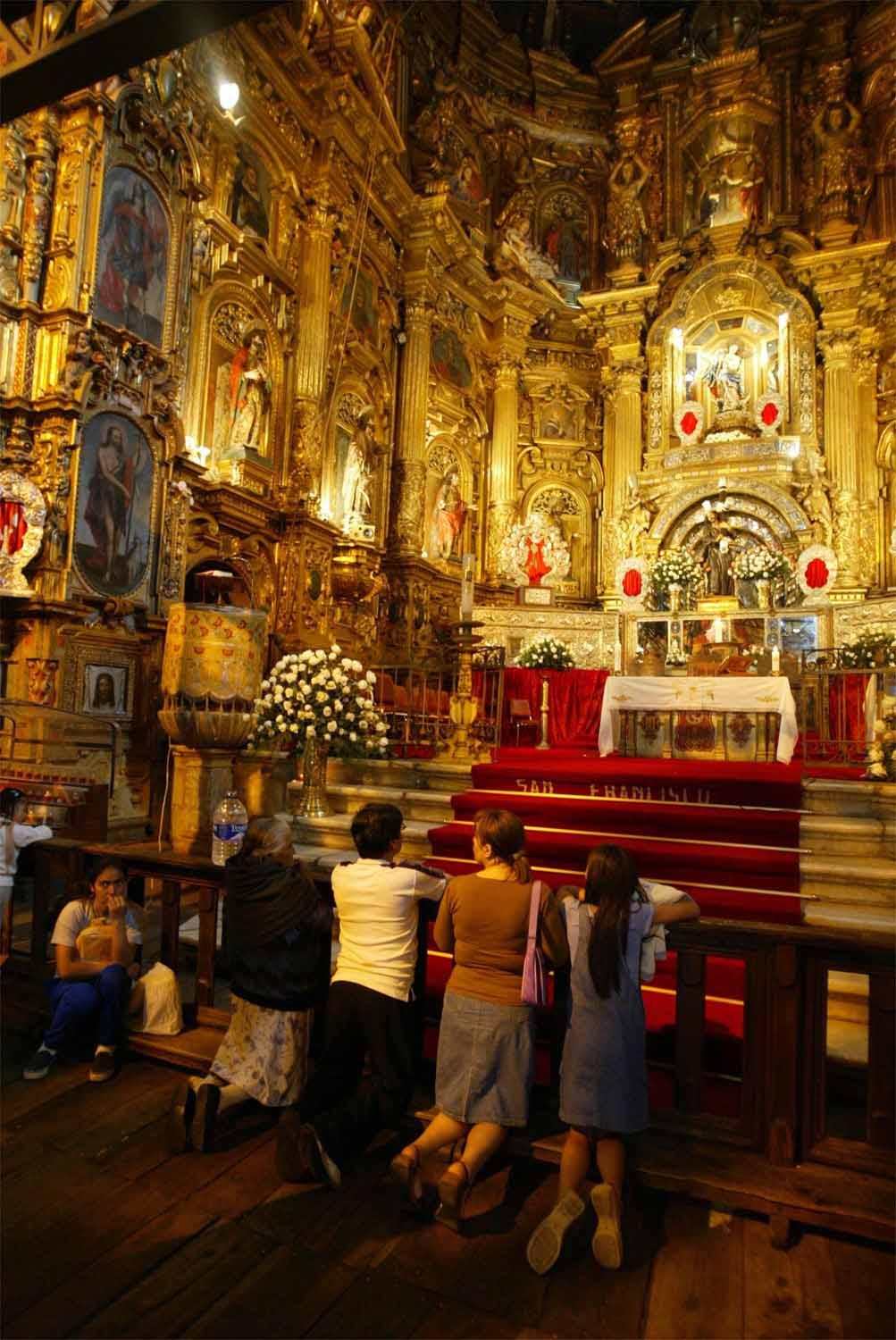 Golden church interiors in Quito